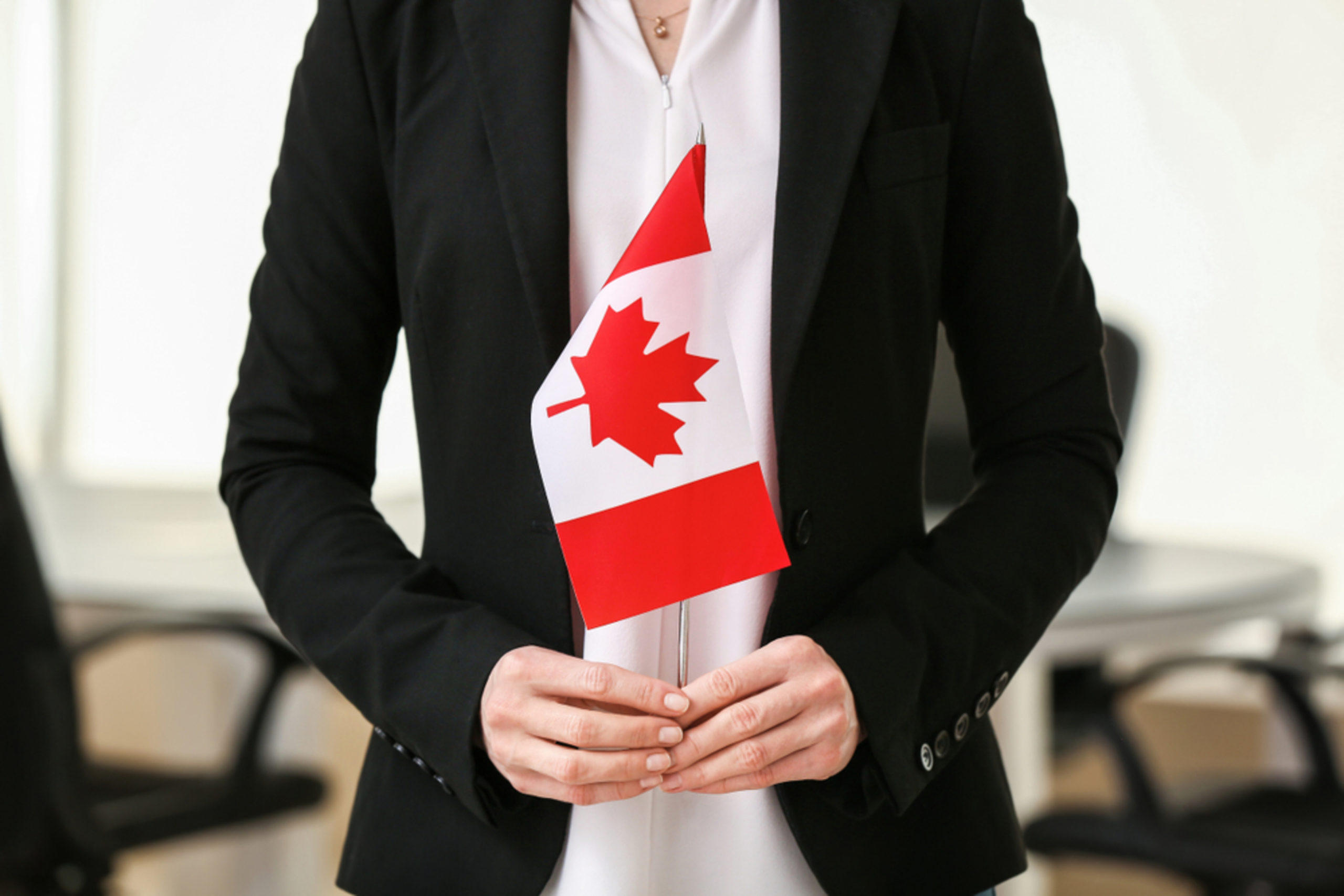 Holding a Canadian Flag